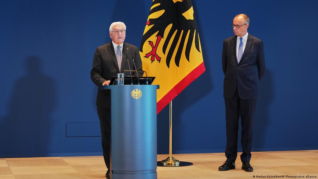 Steinmeier y Merz durante un acto político. 