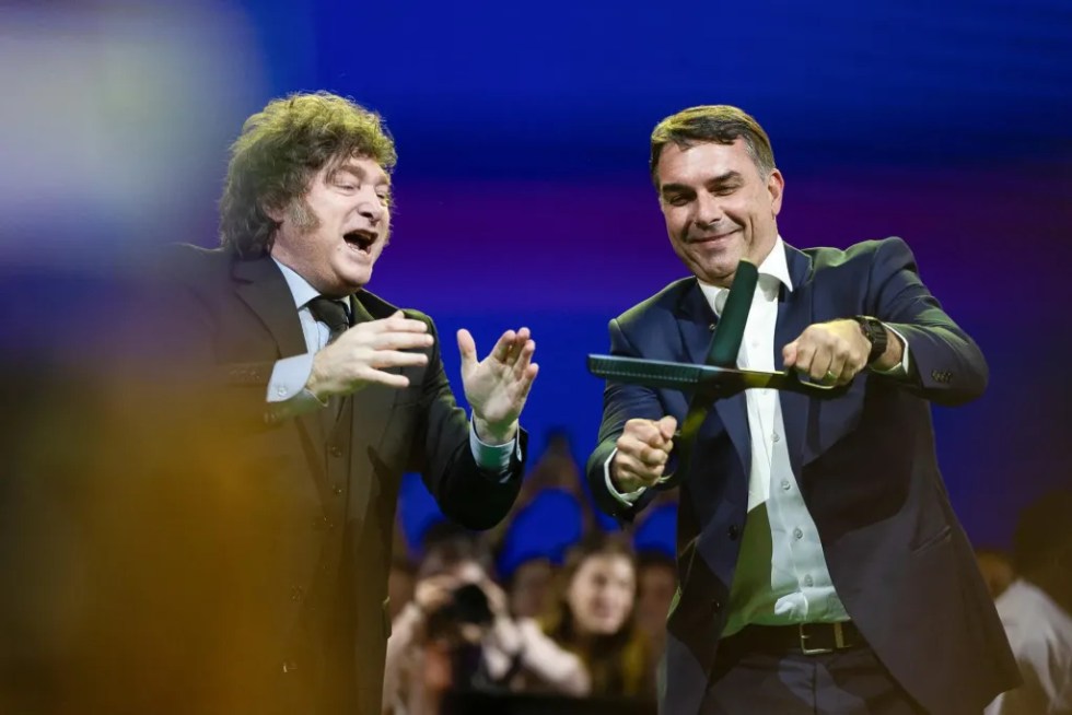 Brazilian Senator Flavio Bolsonaro (R) reacts alongside Argentine President Javier Milei (L) during the national convention of the Brazilian Liberal Party (PL) in Sao Paulo, Brazil, 25 July 2026. EFE/ Isaac Fontana
